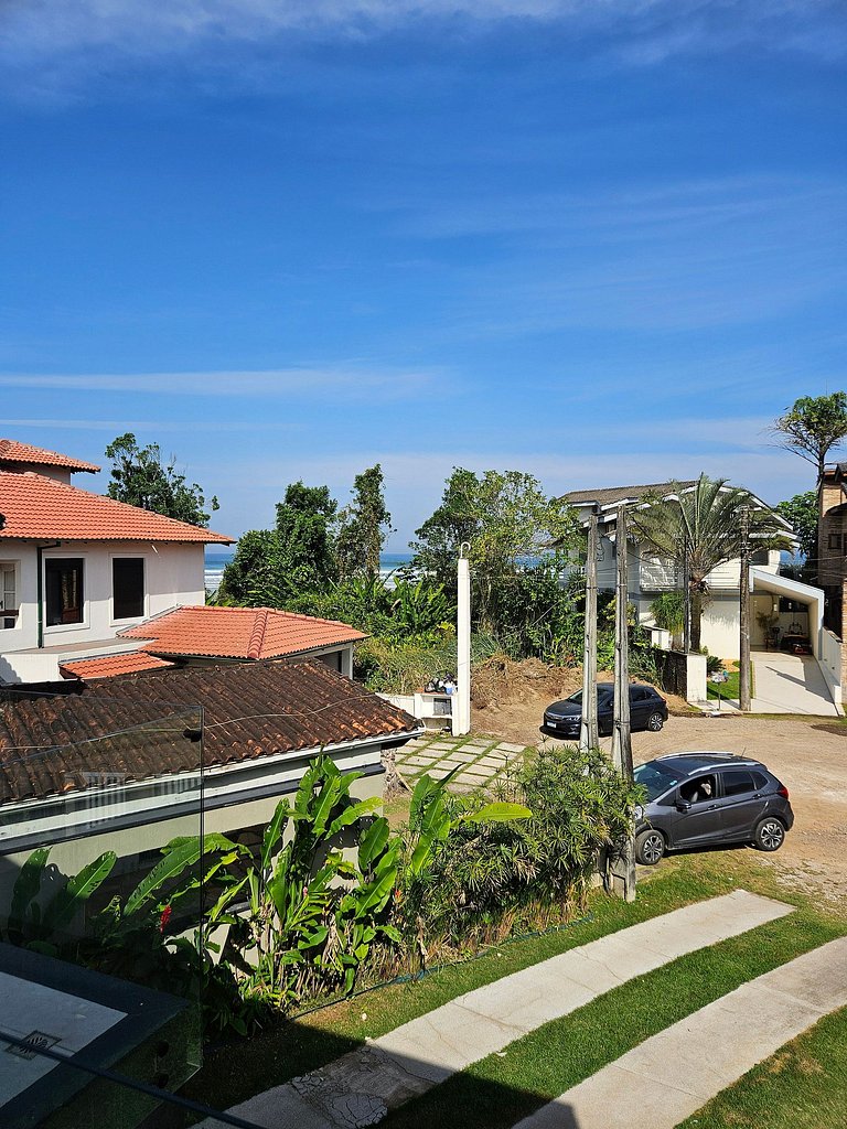 Casa pé na areia recuada com piscina aquecida